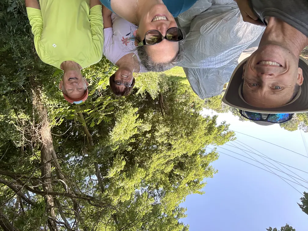 Four volunteers smiling 